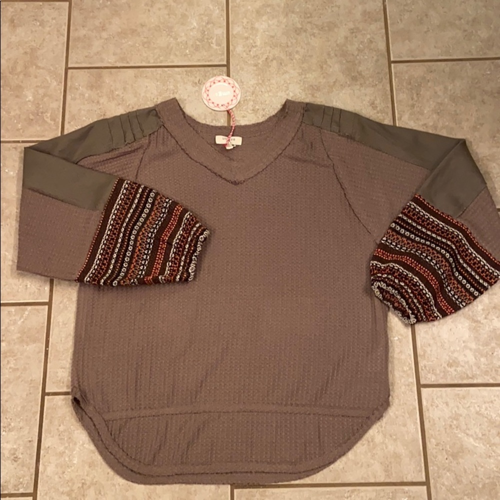 Umgee brand top with detailed sleeves